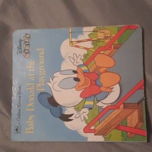 Baby Donald at the playground golden book